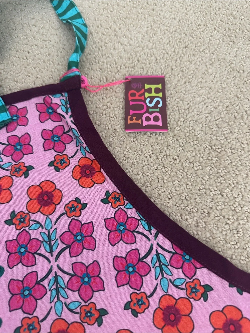 Whimsical Pink Floral Apron with Teal Striped Pocket